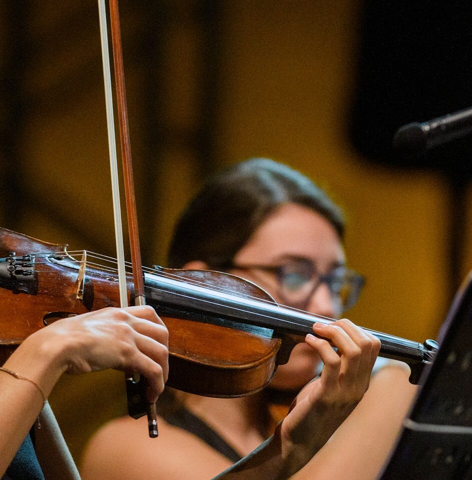 a person playing a violin